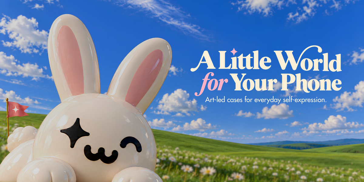The Whimsy Lab rabbit mascot in a green meadow under a blue sky with A Little World for Your Phone editorial text